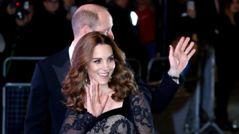 Britain's Prince William, Duke of Cambridge, and Catherine, Duchess of Cambridge, wave as they arrive at the Royal Variety Performance in London, Britain November 18, 2019. REUTERS/Henry Nicholls
