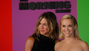 Reese Witherspoon (R) and Jennifer Aniston arrive to the global premiere for Apple's 