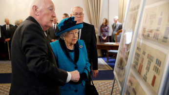 Britain's Queen Elizabeth visits the Royal Philatelic Society in London