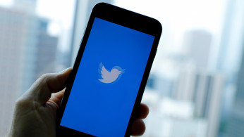 The Twitter App loads on an iPhone in this illustration photograph