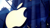 The Apple Inc. logo is seen hanging at the entrance to the Apple store on 5th Avenue in New York
