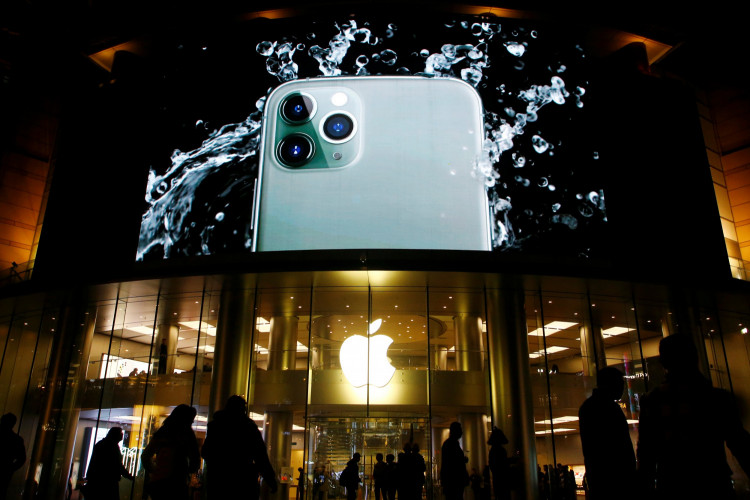 Screen displaying an advertisement for iPhone 11 Pro is seen outside an Apple store in Beijing