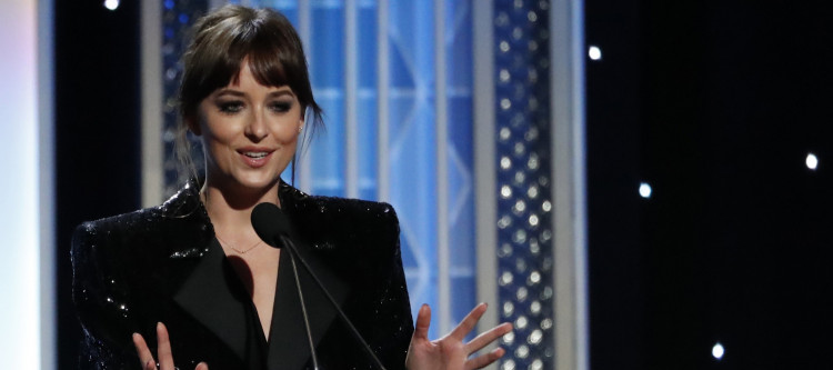 2019 Hollywood Film Awards - Show - Beverly Hills, California, U.S., November 3, 2019 - Dakota Johnson speaks on stage. REUTERS/Mario Anzuoni