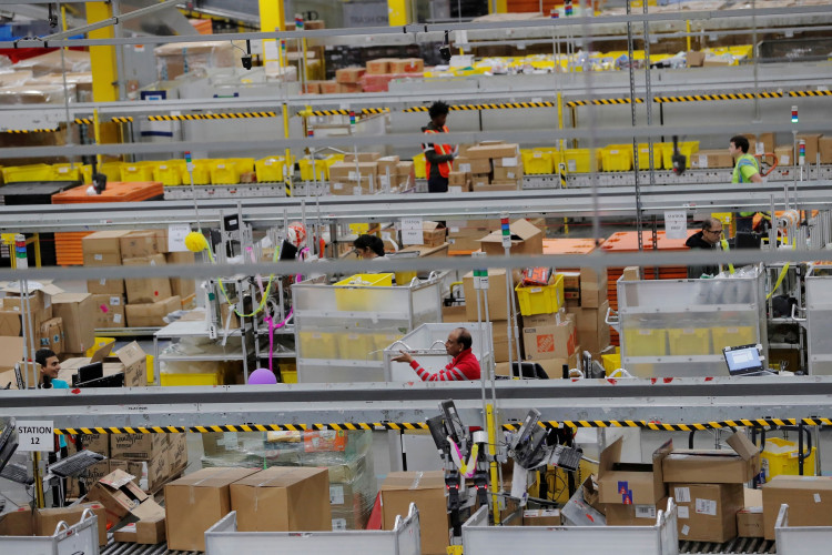 Amazon workers perform their jobs inside of an Amazon fulfillment center on Cyber Monday in Robbinsville, New Jersey, U.S., December 2, 2019.