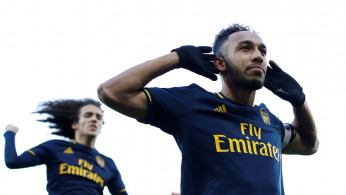 Arsenal's Pierre-Emerick Aubameyang celebrates scoring their first goal with Matteo Guendouzi 
