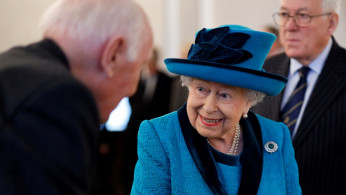 Britain's Queen Elizabeth visits the Royal Philatelic Society in London