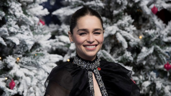 Actor Emilia Clarke poses as she arrives for the U.K. premiere of 