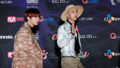 Jungkook and RM, members of South Korean boy band BTS arrive at the red carpet event during the annual MAMA Awards at Nagoya Dome in Nagoya