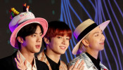 Jin, Jungkook, RM members of South Korean boy band BTS pose on the red carpet during the annual MAMA Awards at Nagoya Dome in Nagoya