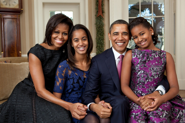 The Obama family in the Oval Office.