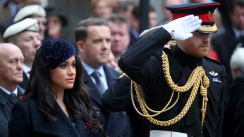 Britain's Prince Harry and Meghan, Duchess of Sussex, visit the Field of Remembrance at Westminster Abbey in London
