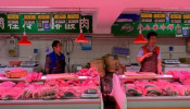 Pork vendors at a market in Beijing