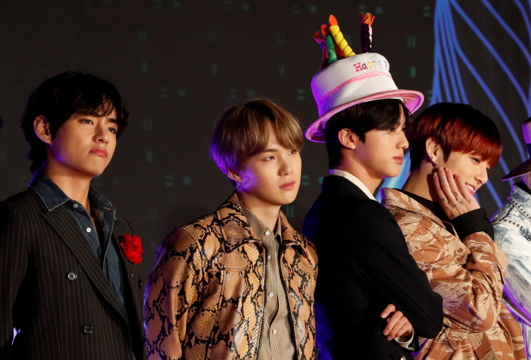 V, Suga, Jin and Jungkook, members of South Korean boy band BTS pose on the red carpet during the annual MAMA Awards at Nagoya Dome in Nagoya, Japan, December 4, 2019. REUTERS/Kim Kyung-Hoon