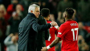 Jose Mourinho shakes hands with Manchester United's Fred after the match 