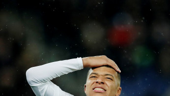 Paris St Germain's Kylian Mbappe reacts 
