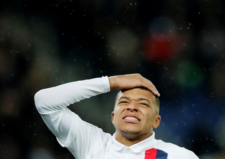 Paris St Germain's Kylian Mbappe reacts 