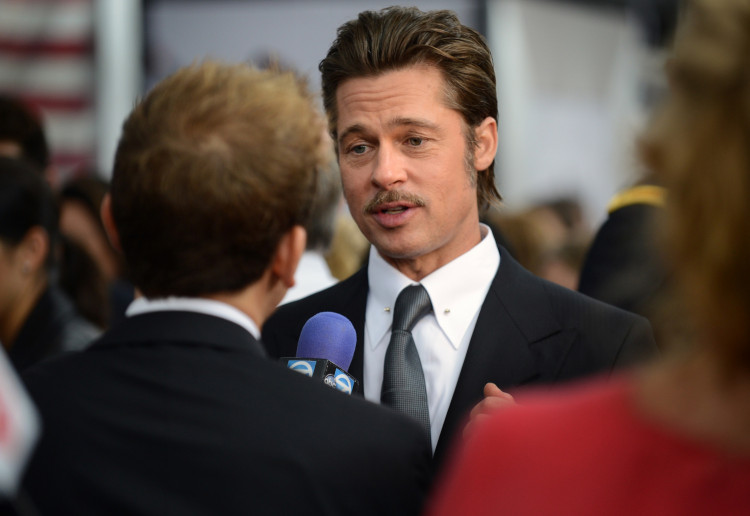 Brad Pitt denies all dating rumors. Photo by DoD News Features/Wikimedia Commons