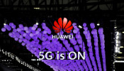 A Huawei logo and a 5G sign are pictured at Mobile World Congress (MWC) in Shanghai, China June 28, 2019.