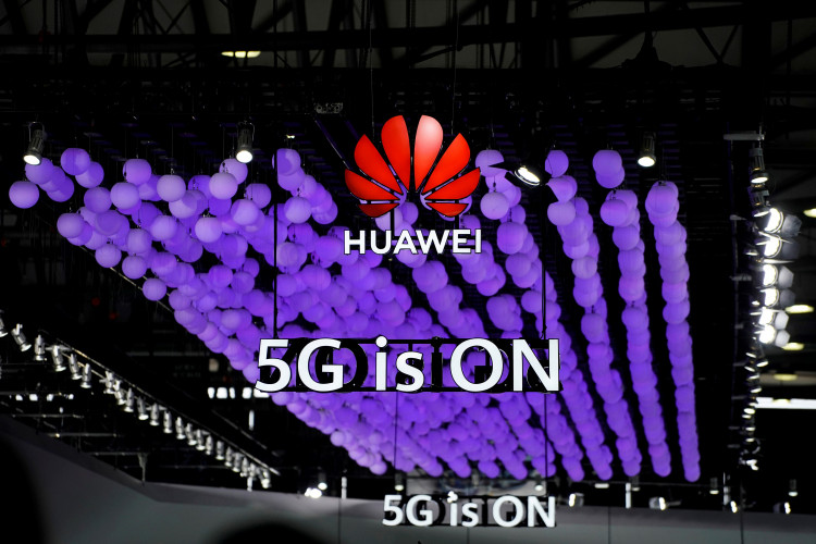 A Huawei logo and a 5G sign are pictured at Mobile World Congress (MWC) in Shanghai, China June 28, 2019.