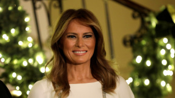U.S. First Lady Melania Trump smiles at the Congressional Ball in the Grand Foyer of the White House in Washington, U.S., December 12, 2019. REUTERS/Yuri Gripas