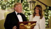 U.S. President Donald Trump with First Lady Melania Trump delivers remarks for the Congressional Ball in the Grand Foyer of the White House in Washington, U.S., December 12, 2019. REUTERS/Yuri Gripas