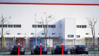 China-made Tesla Model 3 electric vehicles are seen at the Gigafactory of electric carmaker Tesla Inc in Shanghai