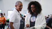 Former U.S. President Barack Obama and former first lady Michelle Obama attend a community service project in Petaling Jaya, Malaysia, December 12, 2019. REUTERS/Lim Huey Teng