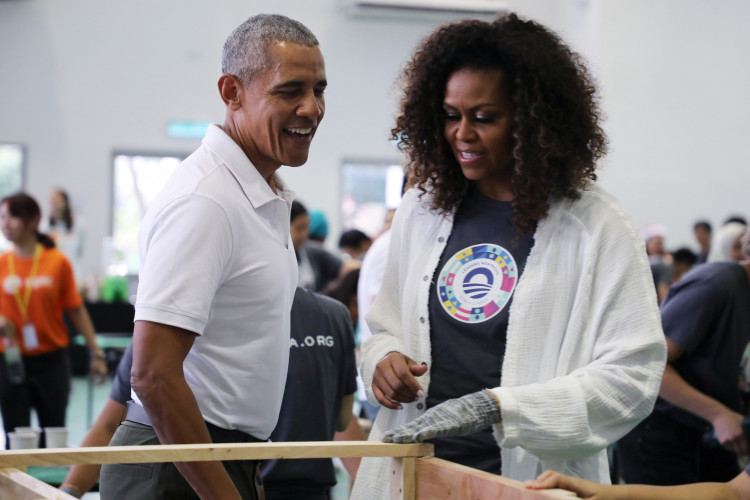 Former U.S. President Barack Obama and former first lady Michelle Obama attend a community service project in Petaling Jaya, Malaysia, December 12, 2019. REUTERS/Lim Huey Teng