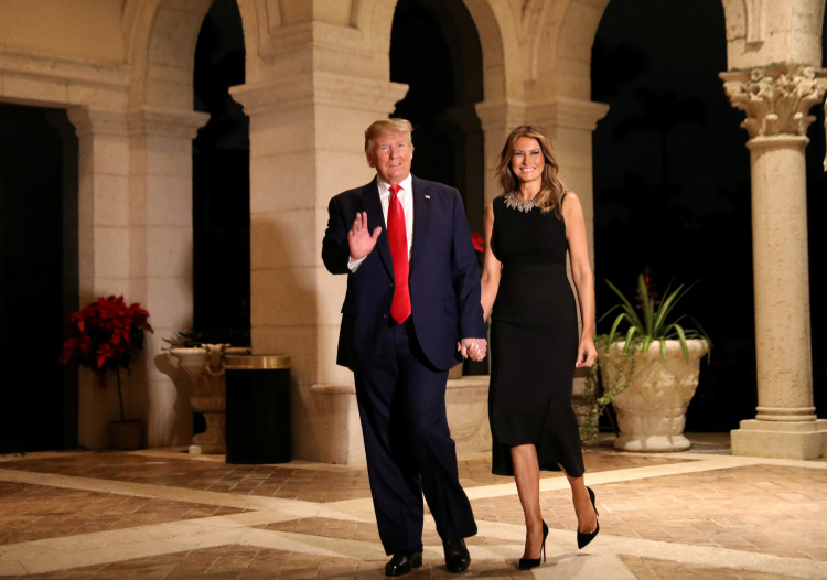 U.S. President Donald Trump and First Lady Melania Trump arrive to their Christmas Eve party at Trump's Mar-a-Lago resort in Palm Beach, Florida, U.S., December 24, 2019. REUTERS/Leah Millis