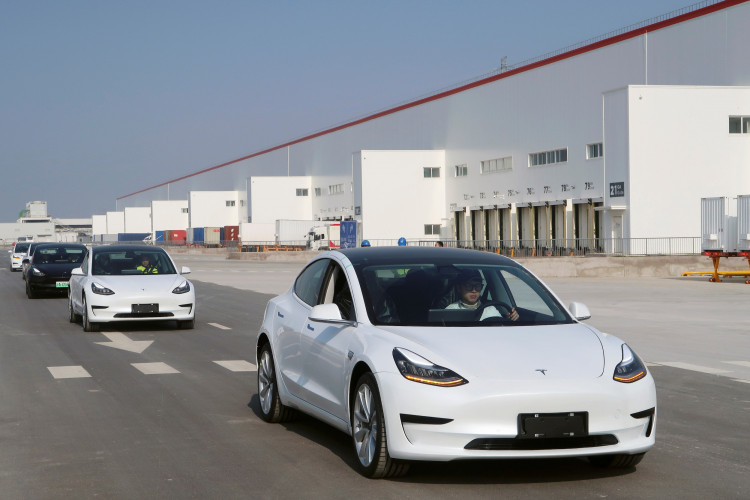 China-made Tesla Model 3 vehicles are seen at the Shanghai Gigafactory of the U.S. electric car maker in Shanghai