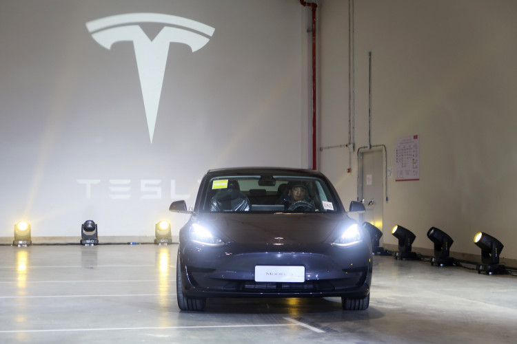 China-made Tesla Model 3 vehicle is seen at a delivery ceremony in the Shanghai Gigafactory of the U.S. electric car maker
