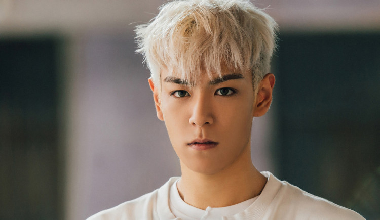 T.O.P wearing a BTS merch is a reminder to everyone that idols support each other.