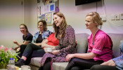 Britain's Catherine meets with staff at Kingston Hospital Maternity Unit