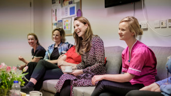 Britain's Catherine meets with staff at Kingston Hospital Maternity Unit