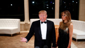 U.S. President Donald Trump accompanied by first lady Melania Trump, speaks to the press at the Mar-a-Lago resort in Palm Beach