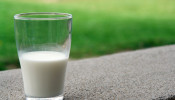 Milk in a clear glass.