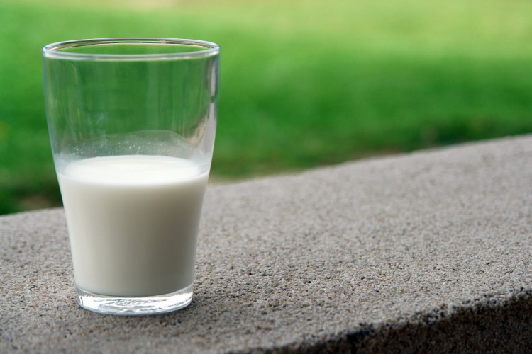 Milk in a clear glass.