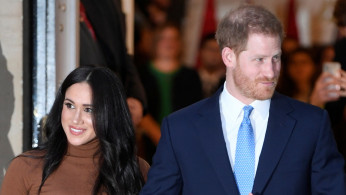 Britain's Prince Harry and his wife Meghan, Duchess of Sussex, leave Canada House in London