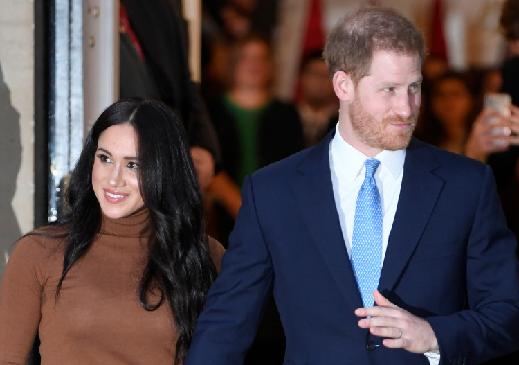 Britain's Prince Harry and his wife Meghan, Duchess of Sussex, leave Canada House in London