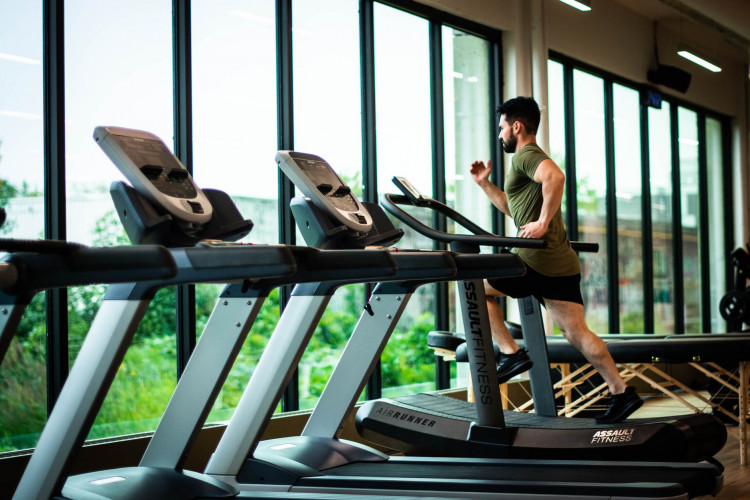 A person using a treadmill.