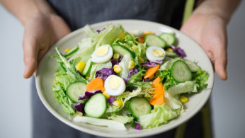 A bowl of vegetable salad.