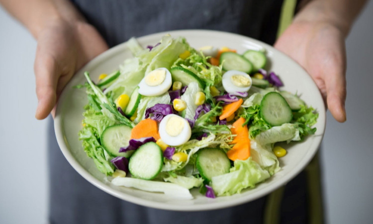 A bowl of vegetable salad.