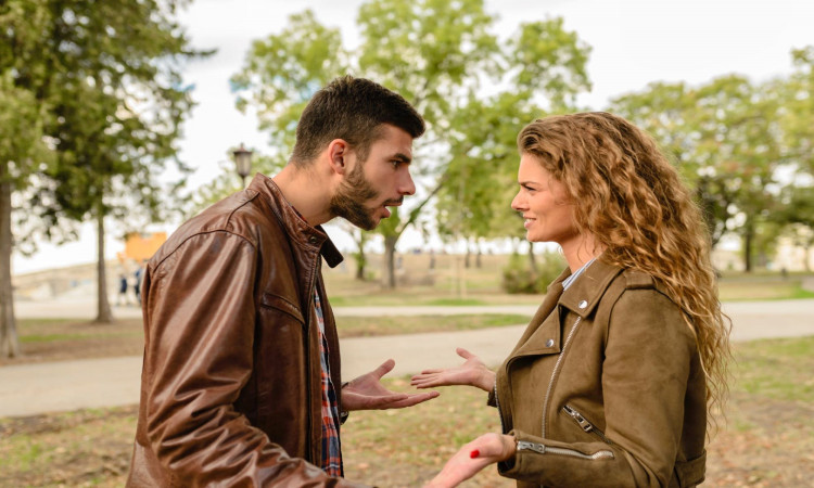 Man and woman arguing.
