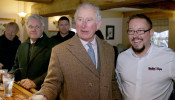 Britain's Prince Charles meets flood victims in Hare and Hounds pub in in Fishlake