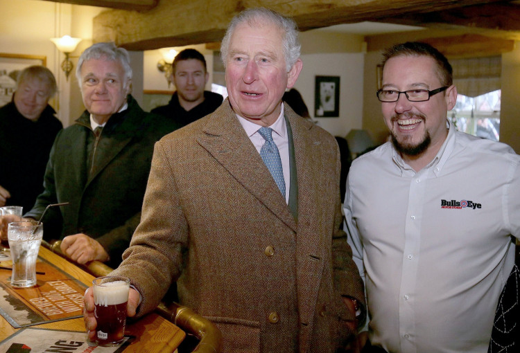 Britain's Prince Charles meets flood victims in Hare and Hounds pub in in Fishlake