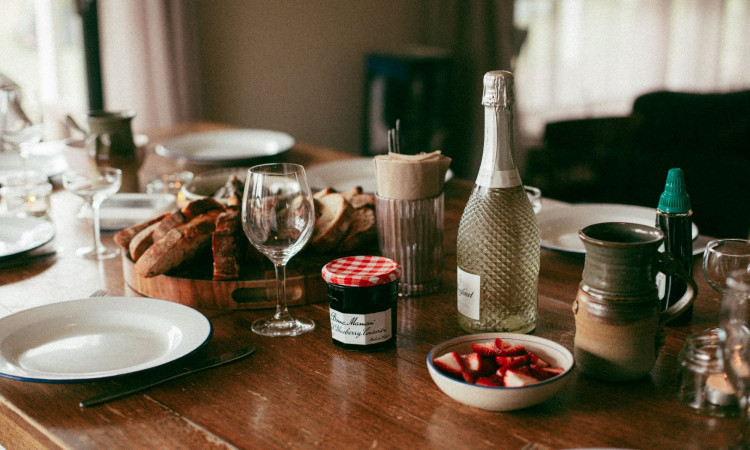 Photo of wine, bread at home.