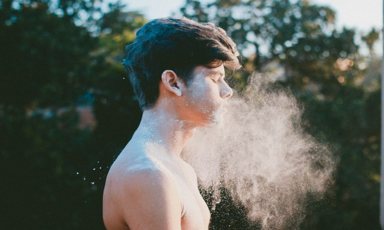 Man with white powder.