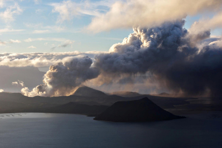 The errupting Taal Volcano is seen at sunrise in Tagaytay City