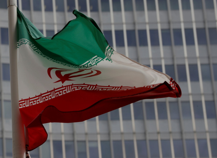 An Iranian flag flutters in front of the International Atomic Energy Agency (IAEA) headquarters in Vienna