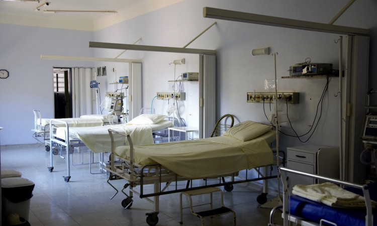 White hospital beds.